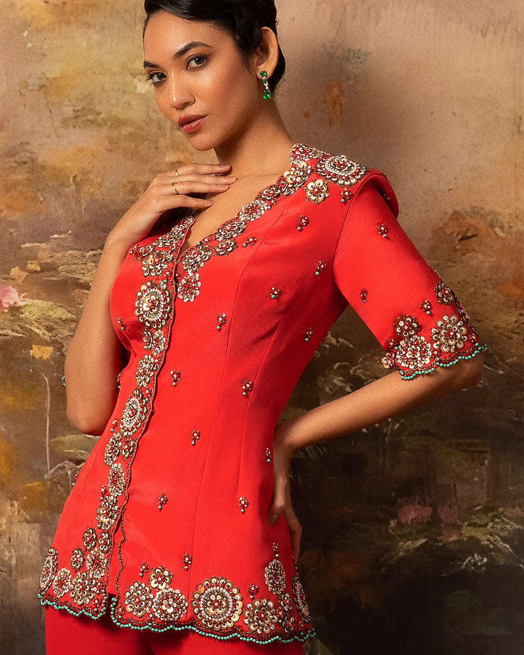 Featuring an embroidered long jacket and sharara pants in gorgette and crepe