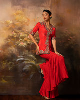 Featuring an embroidered long jacket and sharara pants in gorgette and crepe