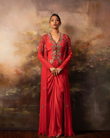 Featuring an embroidered jacket waistcoat and front gathered skirt in crepe and gorgette