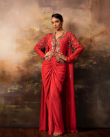 Featuring an embroidered jacket waistcoat and front gathered skirt in crepe and gorgette