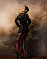 Featuring an embroidered long jacket and sharara pants in gorgette and linen satin