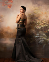 Featuring a embroidered cage corset with long fishtail skirt