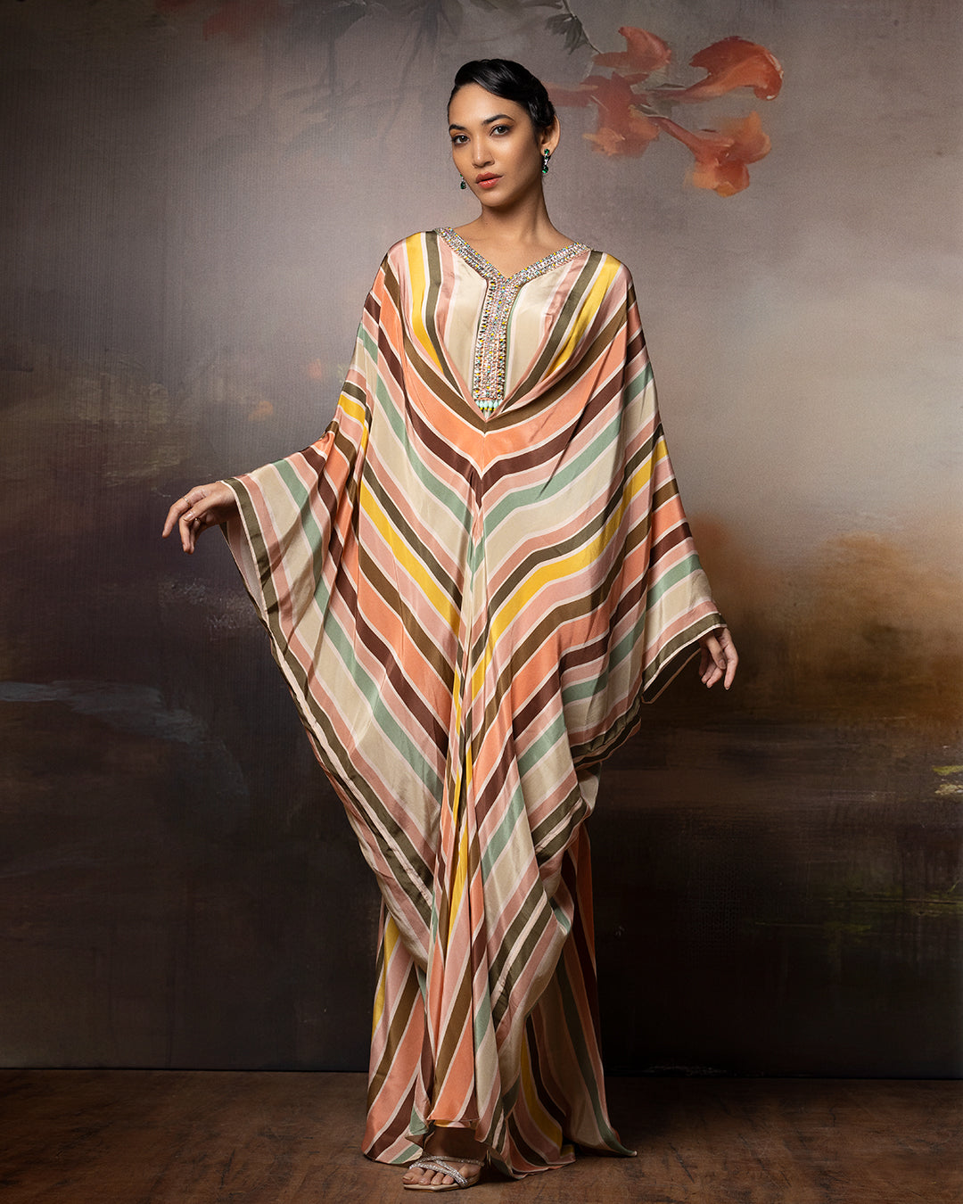 Featuring a embroidered Chevron kaftan in crepe