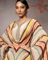 Featuring a embroidered Chevron kaftan in crepe