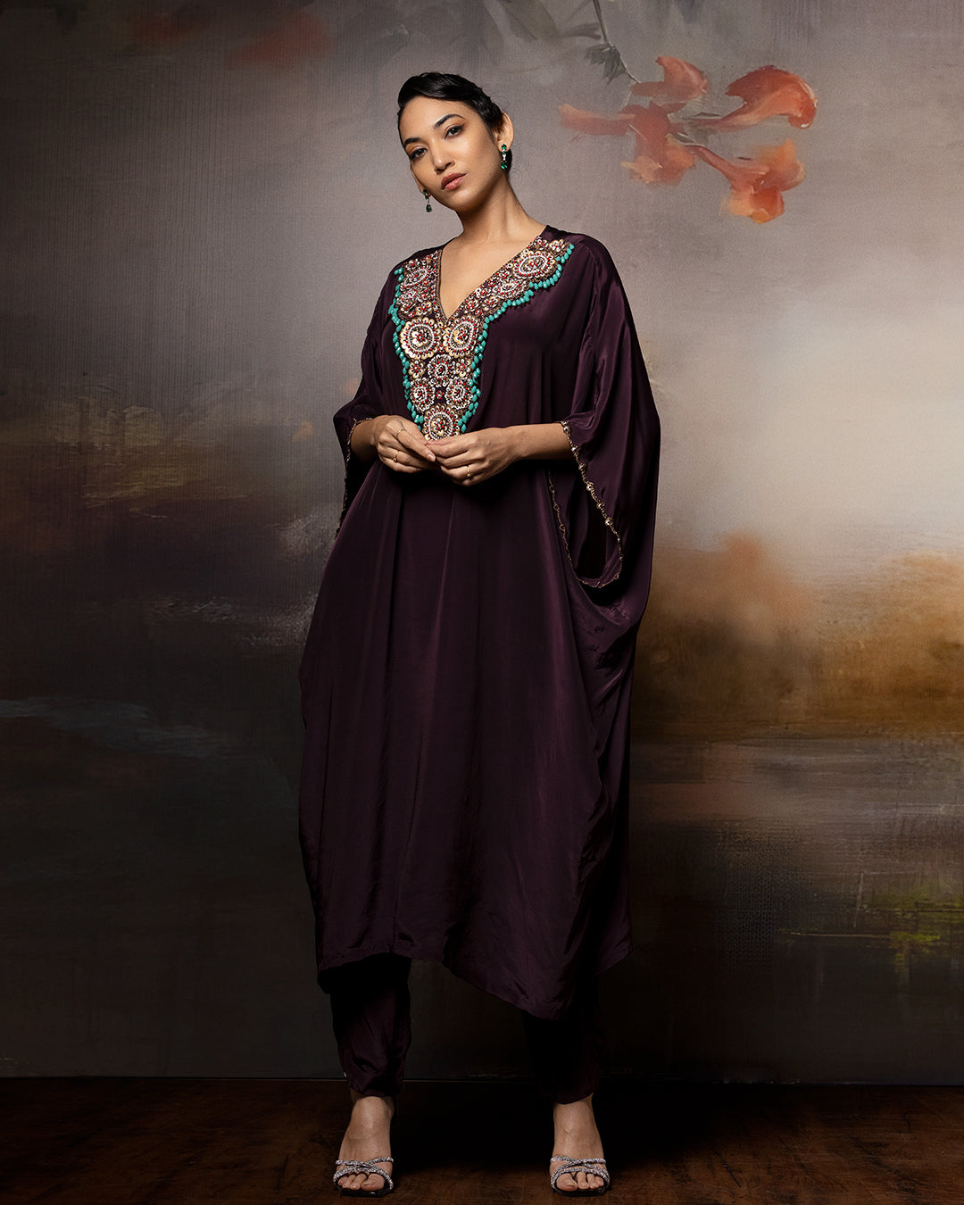 Featuring a brown embroidered kaftan set in crepe