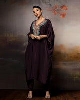 Featuring a brown embroidered kaftan set in crepe