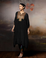 Featuring a kaftan kurta with chevron pants with embroidery patch on the neck