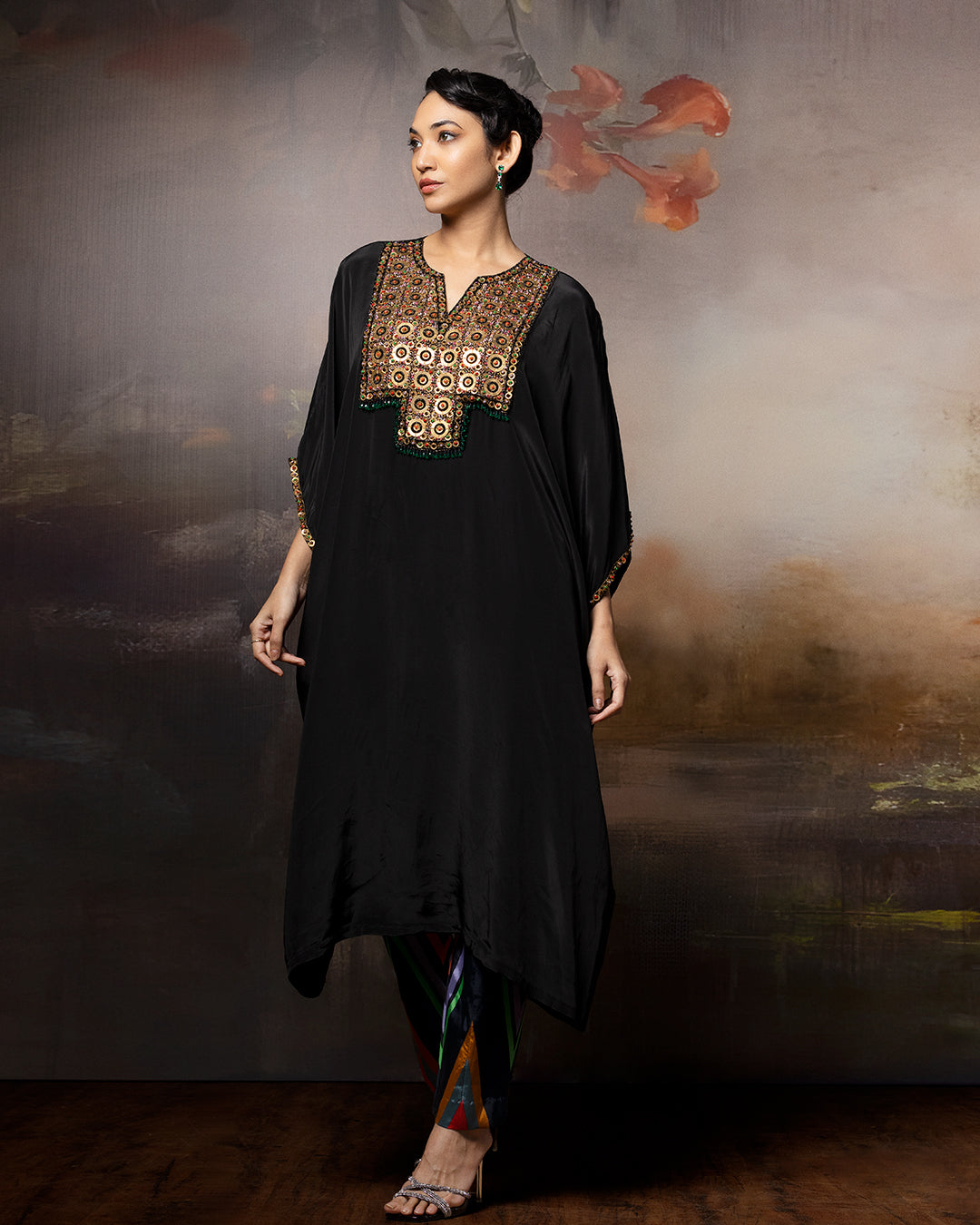 Featuring a kaftan kurta with chevron pants with embroidery patch on the neck