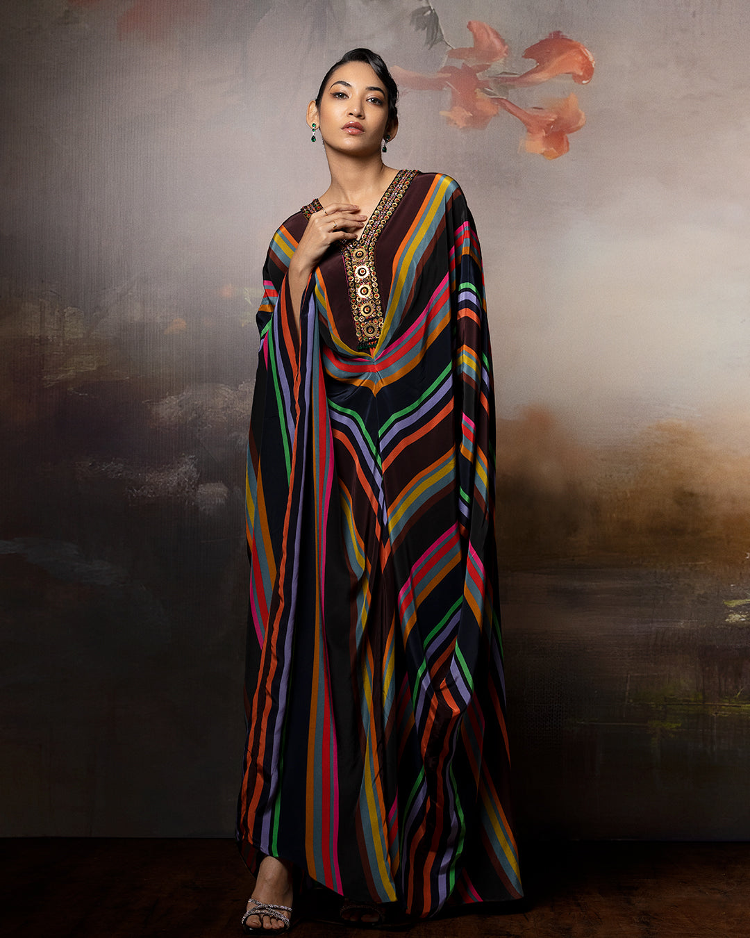 Featuring a chevron kaftan with embroidered neck