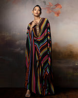Featuring a chevron kaftan with embroidered neck