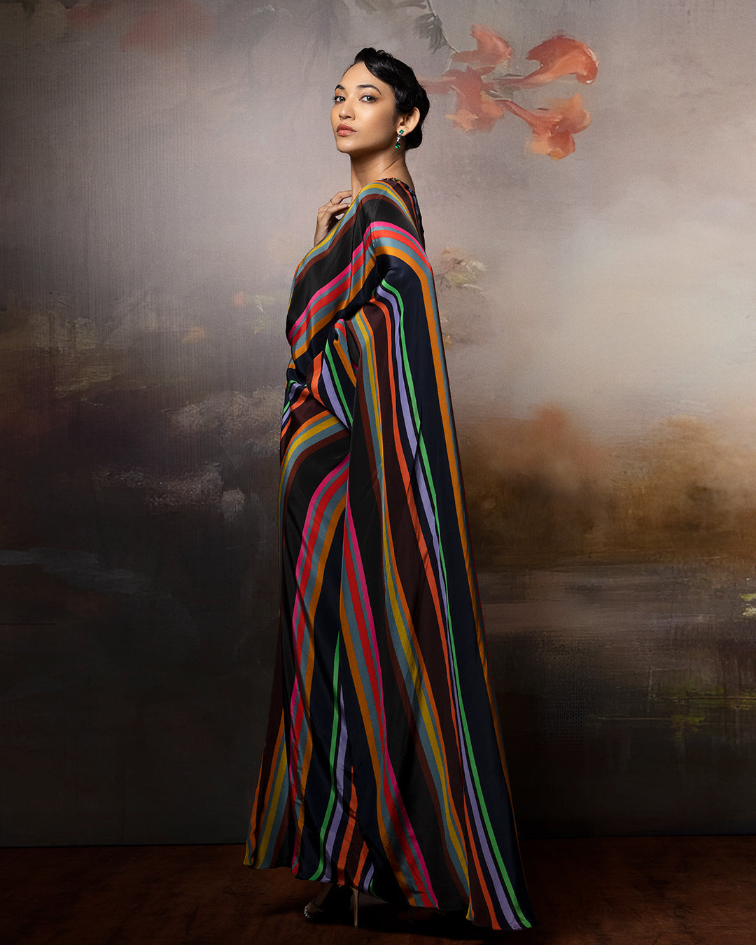 Featuring a chevron kaftan with embroidered neck