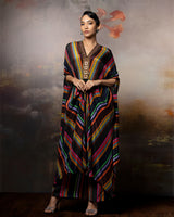 Featuring an embroidered chevron kaftan co-ord set in crepe