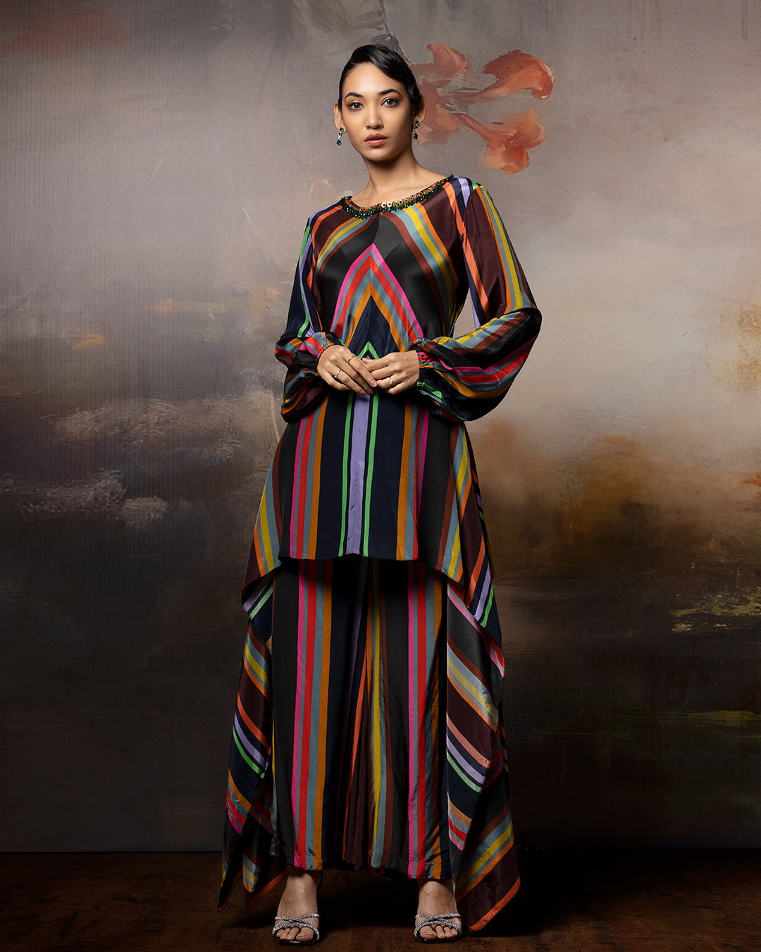 Featuring an embroidered chevron kaftan co-ord set in crepe