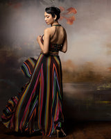 Featuring an embroidered haulter top with lehenga pants in gorgette and crepe