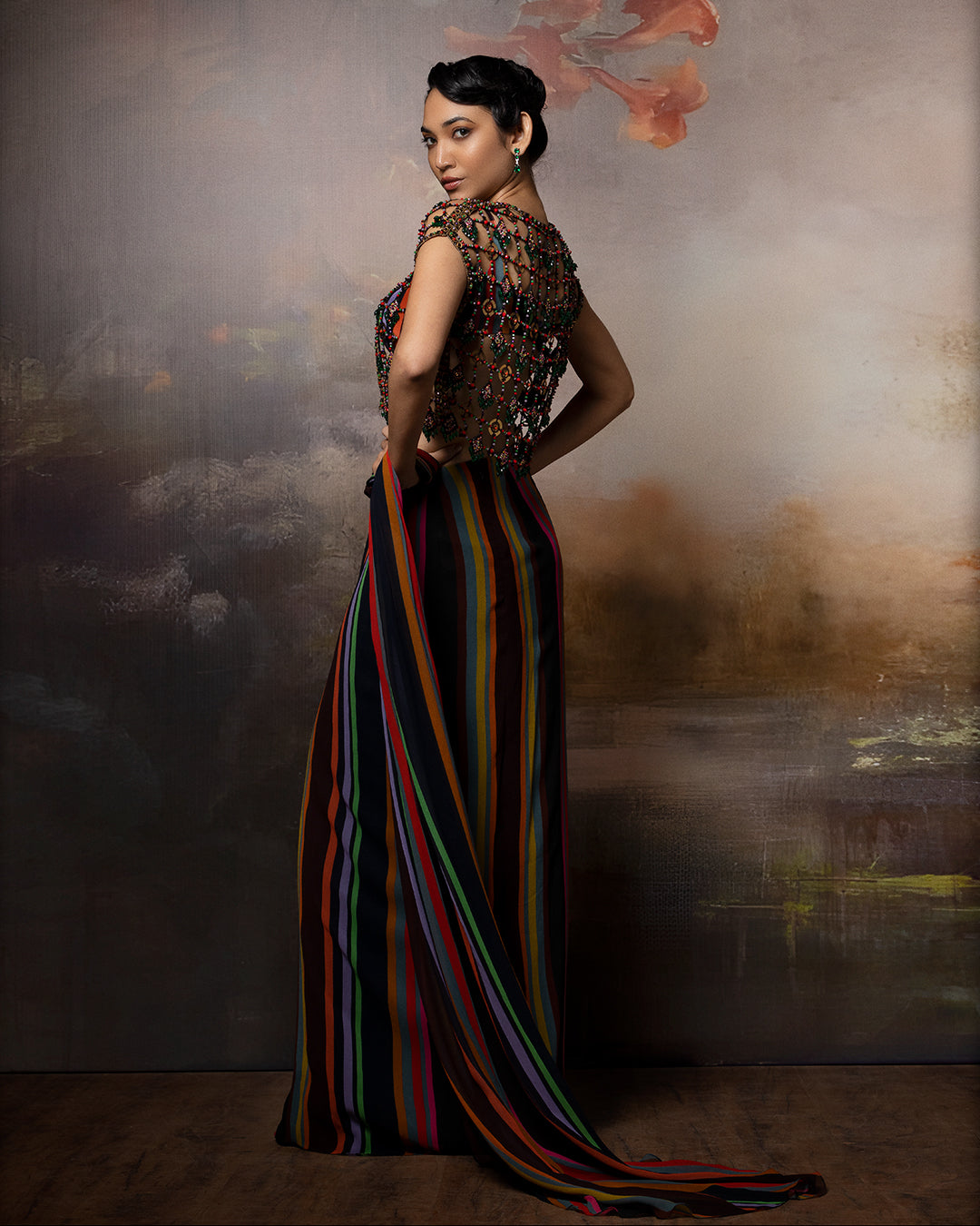 Featuring a attached saree with mesh jacket in gorgette and crepe