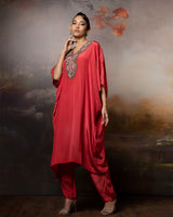 Featuring a kaftan kurti in crepe with embroidered neck