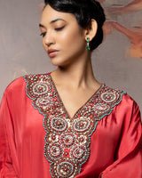 Featuring a kaftan kurti in crepe with embroidered neck