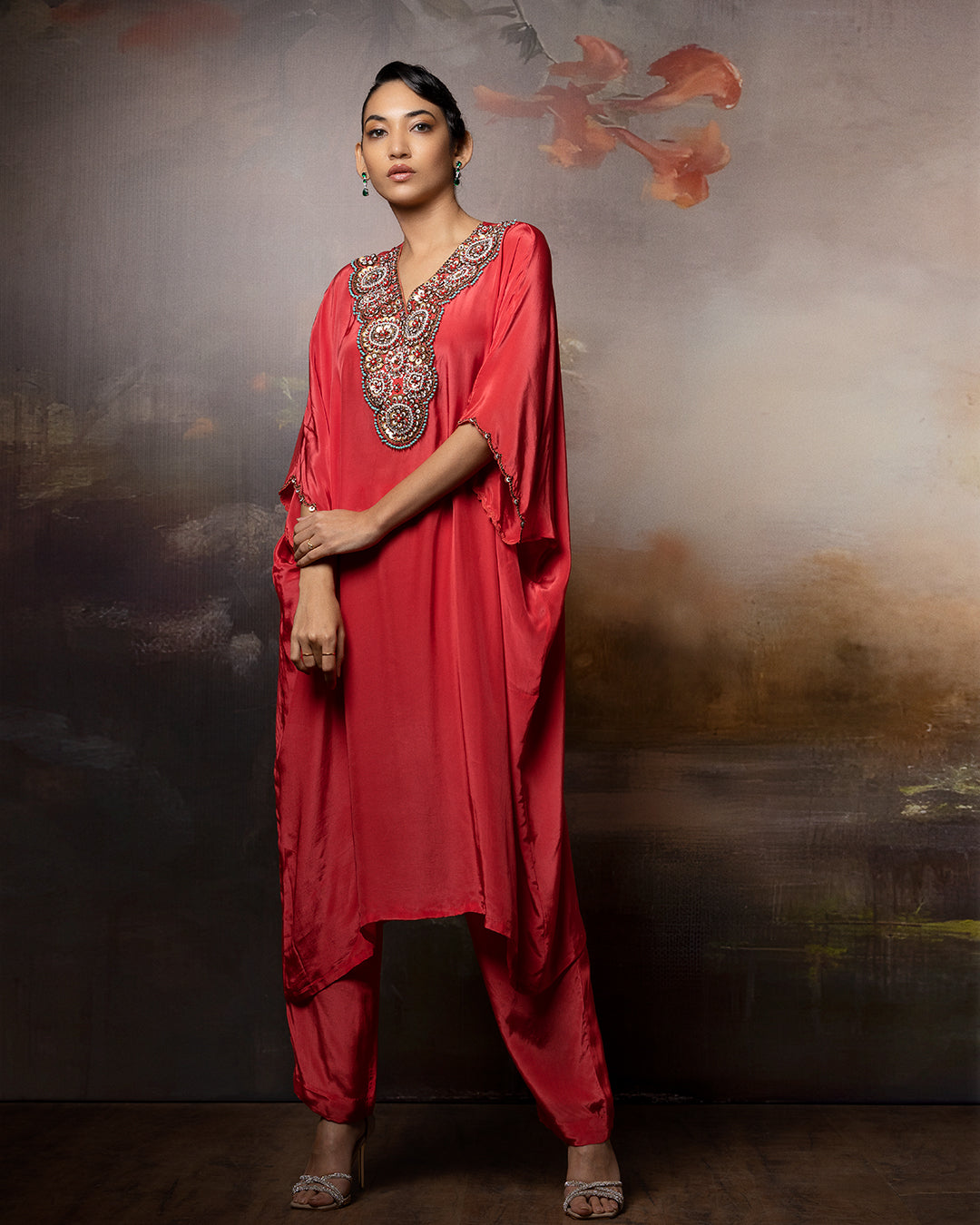 Featuring a kaftan kurti in crepe with embroidered neck