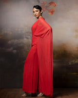 Featuring a coral cowl jumpsuit in gorgette
